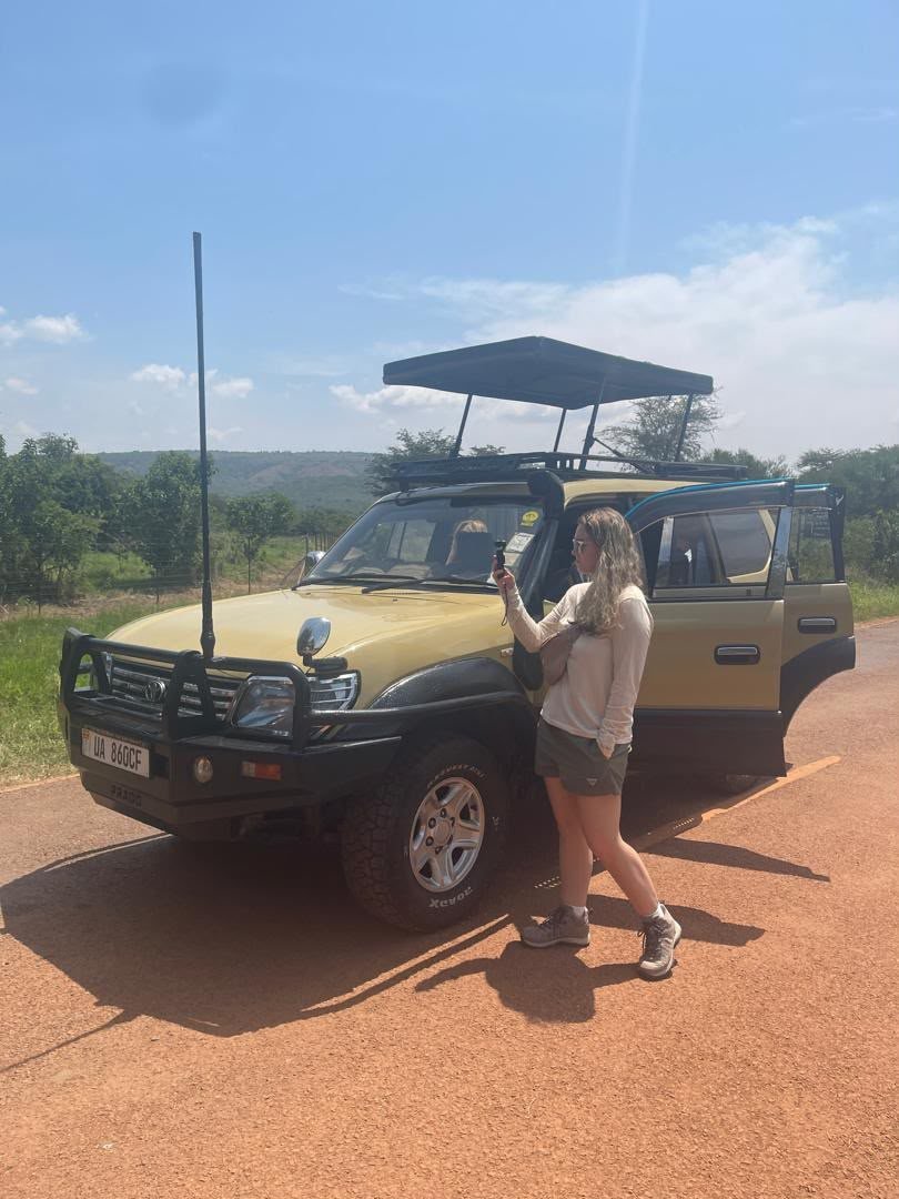 Safari vehicle with driver-guide